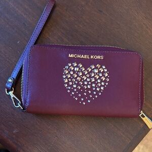 Michael Kors Plum Wristlet with gold Studded Heart